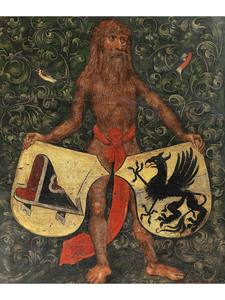Darstellung eines Wilden Mannes auf einem Wandteppich. Er hält zwei Wappen in der Hand und steht vor grünen Blättern.